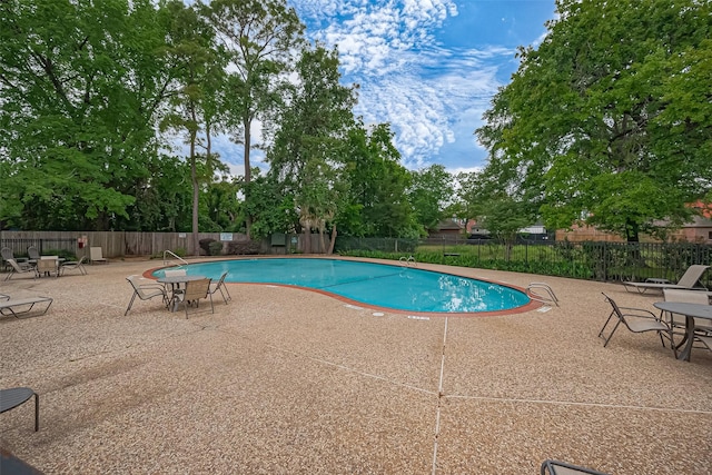 859 Wax Myrtle Ln, Houston, TX 77079 - community pool featuring fence and a patio area