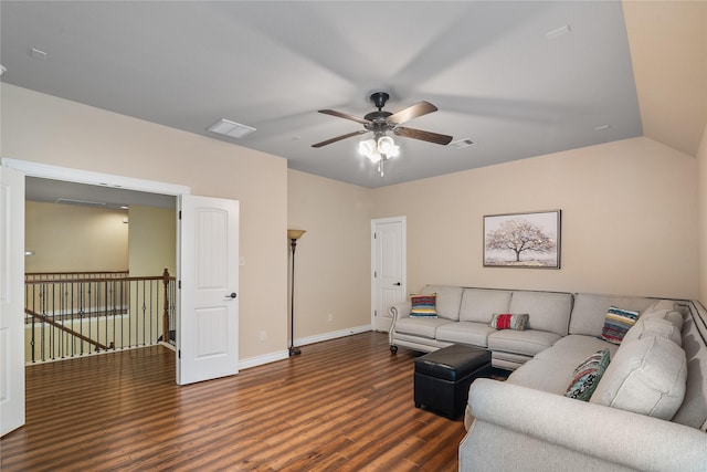 living room featuring baseboards, a ceiling fan, wood finished floors, and visible vents