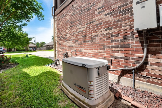 details with brick siding and a power unit