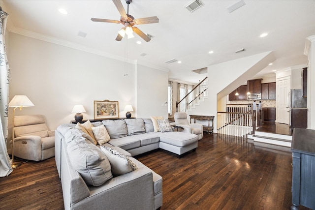 living room with dark wood finished floors, visible vents, a ceiling fan, and recessed lighting
