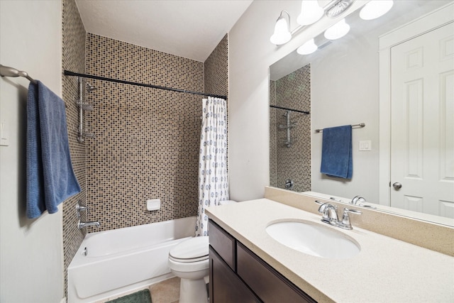 bathroom featuring toilet, tile patterned floors, shower / bath combo with shower curtain, and vanity