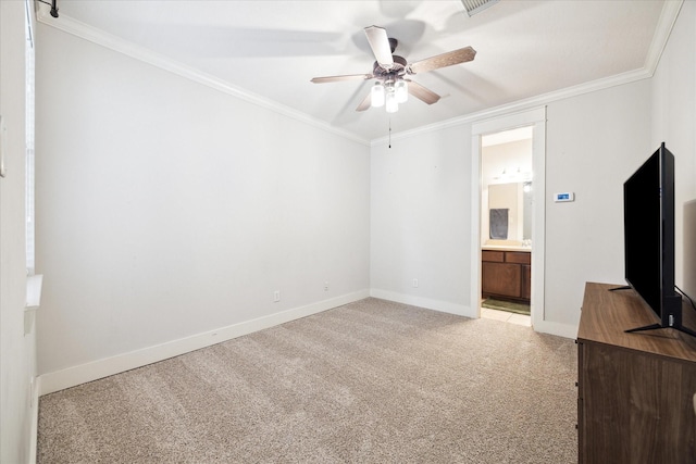 unfurnished living room with baseboards, ceiling fan, crown molding, and light colored carpet