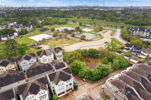 drone / aerial view with a residential view and a city view