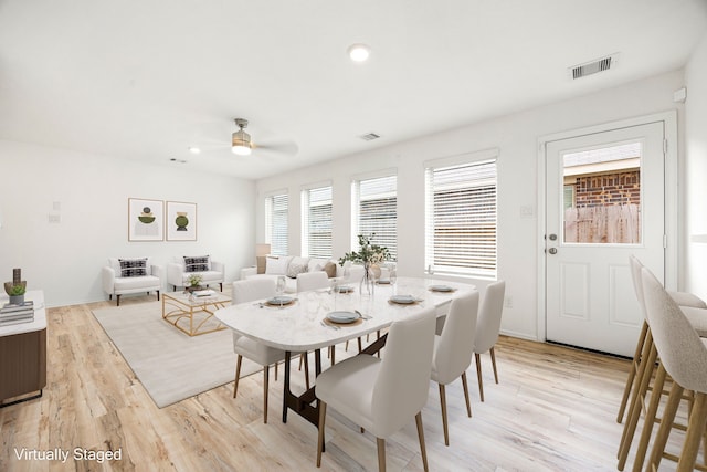 dining room with recessed lighting, light wood finished floors, visible vents, and a ceiling fan