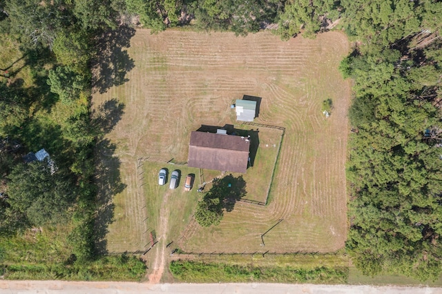 271 Woodman Dr, Cleveland, TX 77328 - birds eye view of property featuring a rural view