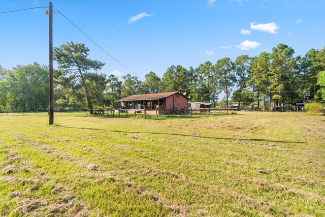271 Woodman Dr, Cleveland, TX 77328 - view of yard with fence
