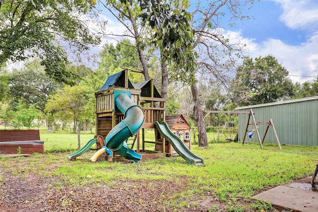 view of jungle gym featuring a lawn