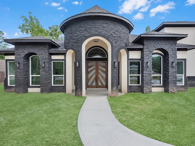 549 Rd 660, Dayton, TX 77535 - view of front of property featuring stucco siding, a front lawn, and stone siding