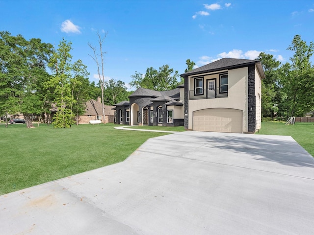 549 Rd 660, Dayton, TX 77535 - view of front of property featuring stucco siding, driveway, stone siding, a front yard, and a garage