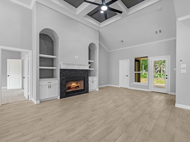 549 Rd 660, Dayton, TX 77535 - unfurnished living room featuring visible vents, a towering ceiling, baseboards, and a ceiling fan