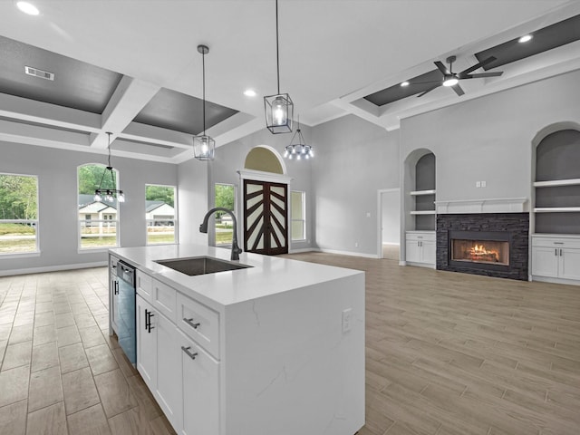 549 Rd 660, Dayton, TX 77535 - kitchen with a sink, dishwasher, baseboards, coffered ceiling, and visible vents