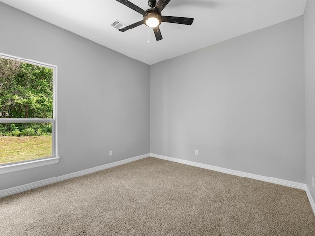 549 Rd 660, Dayton, TX 77535 - empty room featuring carpet, visible vents, a ceiling fan, and baseboards