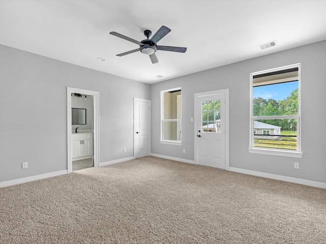 549 Rd 660, Dayton, TX 77535 - spare room featuring ceiling fan, baseboards, carpet flooring, and visible vents