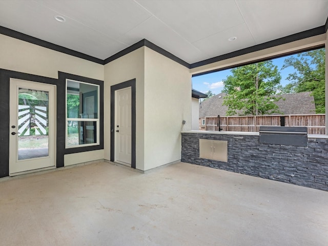 549 Rd 660, Dayton, TX 77535 - view of patio with fence and exterior kitchen