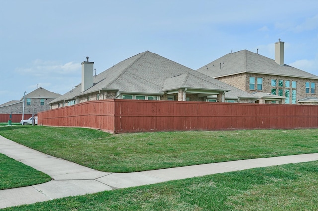 view of yard with fence