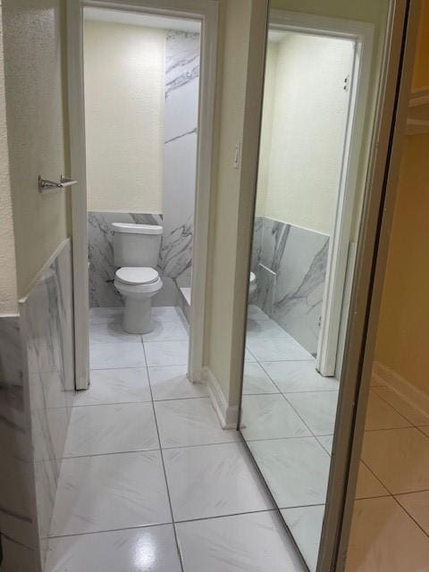 11411 Meadow Joy Dr, Houston, TX 77089 - bathroom featuring tile patterned flooring and toilet