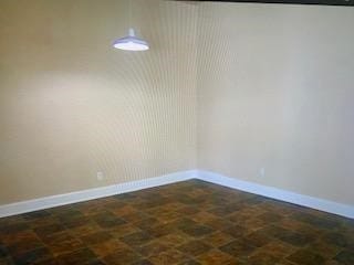4620 Oak Ridge St, Houston, TX 77009 - spare room with baseboards