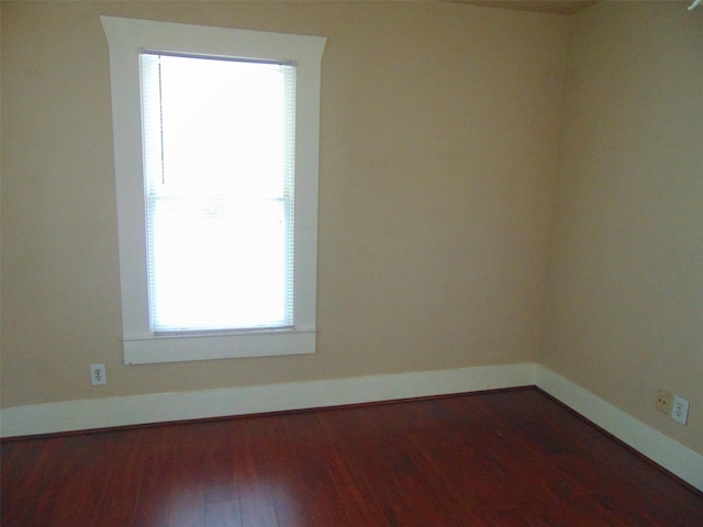 4620 Oak Ridge St, Houston, TX 77009 - unfurnished room with baseboards and wood finished floors