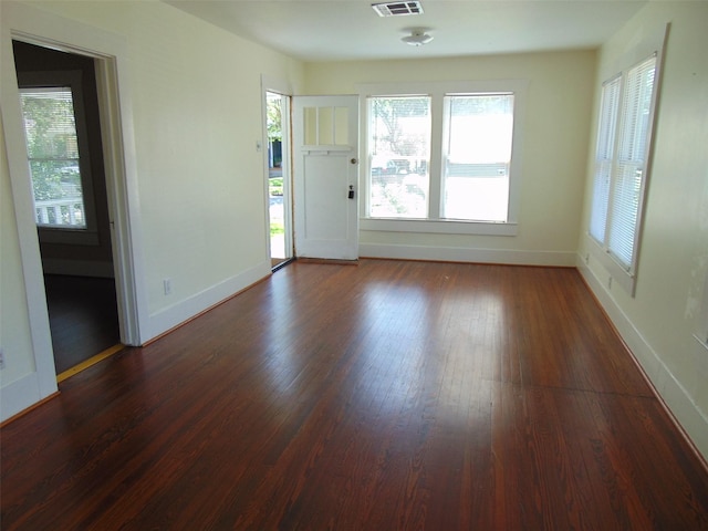 4620 Oak Ridge St, Houston, TX 77009 - interior space featuring a healthy amount of sunlight, dark wood-style floors, and visible vents