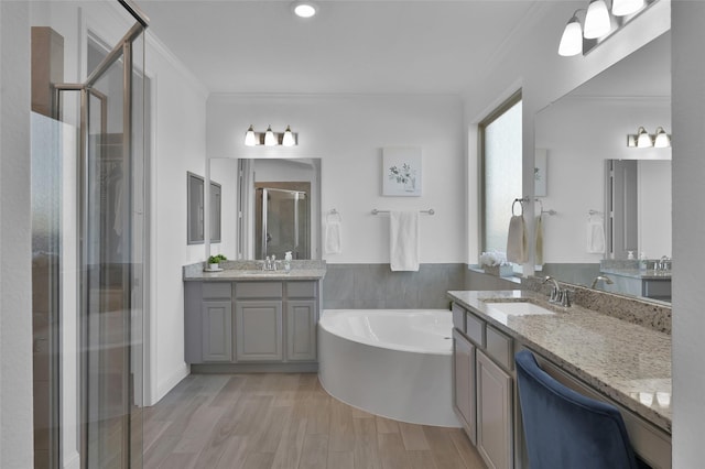 15534 Ponderosa Bend Dr, Cypress, TX 77429 - full bath with a shower stall, crown molding, a bath, and a sink