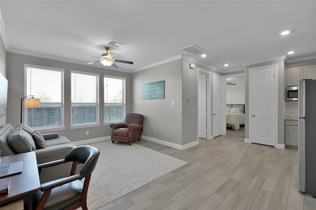 15534 Ponderosa Bend Dr, Cypress, TX 77429 - living room with recessed lighting, light wood finished floors, a ceiling fan, ornamental molding, and baseboards