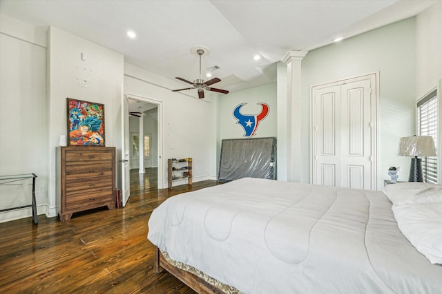 bedroom with visible vents, baseboards, recessed lighting, wood finished floors, and a closet