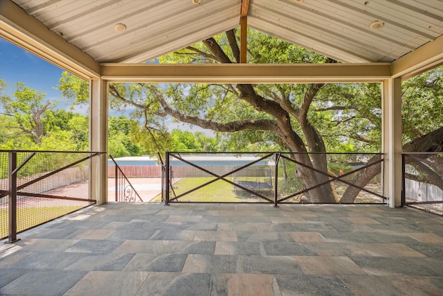 view of patio with a gate and fence