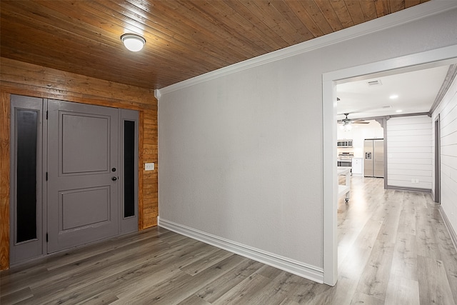 559 Doty Rd, Vidor, TX 77662 - entrance foyer with light wood-type flooring, baseboards, ceiling fan, and crown molding