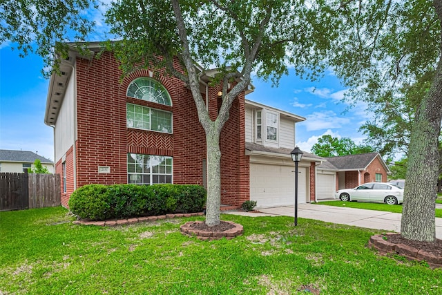 215 Pebble Canyon Ln, Dickinson, TX 77539 - view of front of house with an attached garage, concrete driveway, and brick siding