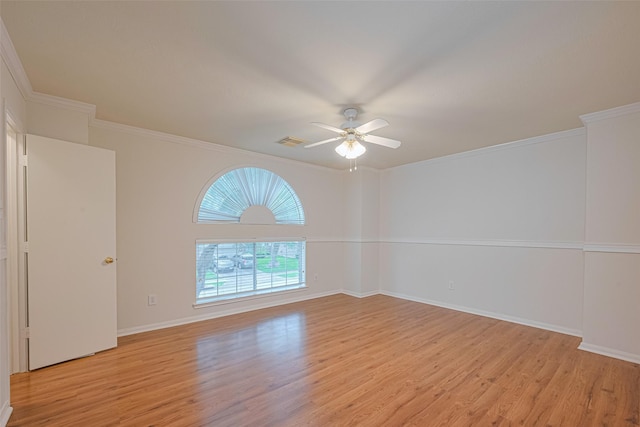 215 Pebble Canyon Ln, Dickinson, TX 77539 - unfurnished room featuring light wood-type flooring, ceiling fan, ornamental molding, and baseboards