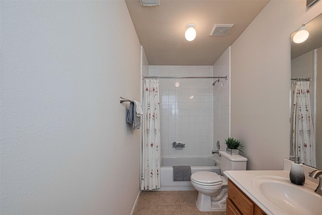 215 Pebble Canyon Ln, Dickinson, TX 77539 - bathroom with vanity, toilet, tile patterned flooring, shower / bathtub combination with curtain, and baseboards