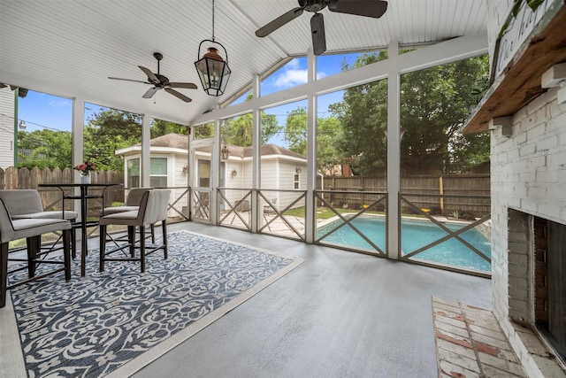sunroom with ceiling fan