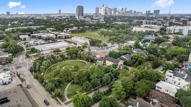 birds eye view of property with a city view
