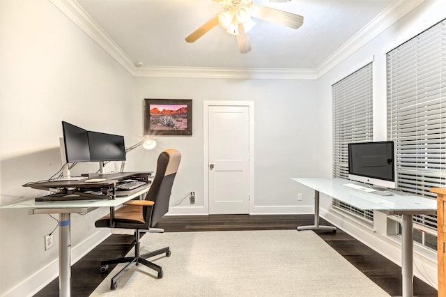 office space featuring a ceiling fan, baseboards, ornamental molding, and dark wood-type flooring