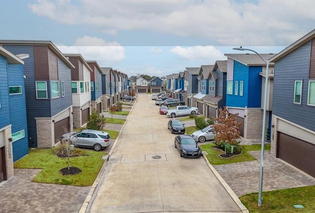 view of road with street lighting and a residential view