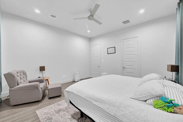 bedroom with recessed lighting, baseboards, visible vents, and light wood-type flooring