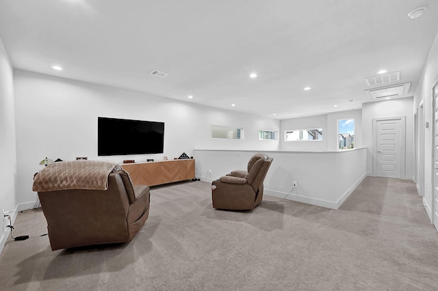 living room with visible vents, recessed lighting, and baseboards