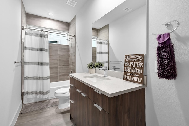 full bathroom featuring vanity, shower / bath combo, toilet, and visible vents