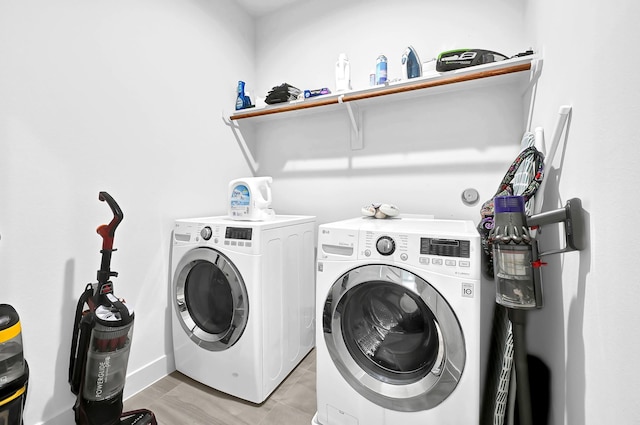 laundry room with laundry area and washing machine and dryer