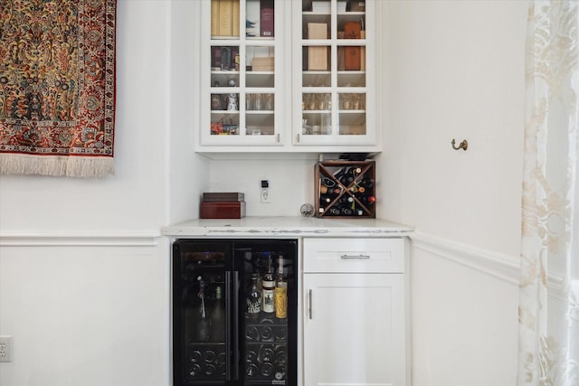 2842 Briarhurst Park, Houston, TX 77057 - bar featuring wine cooler and a bar