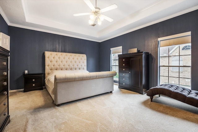 2842 Briarhurst Park, Houston, TX 77057 - carpeted bedroom with a raised ceiling, crown molding, and a ceiling fan