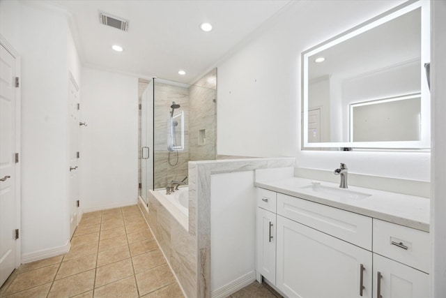 2842 Briarhurst Park, Houston, TX 77057 - bathroom featuring a garden tub, tile patterned floors, a stall shower, vanity, and visible vents