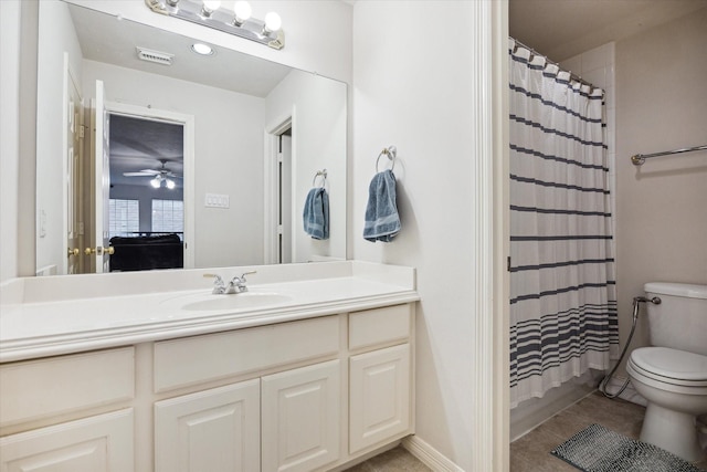 2842 Briarhurst Park, Houston, TX 77057 - full bath with visible vents, toilet, vanity, a shower with shower curtain, and ceiling fan