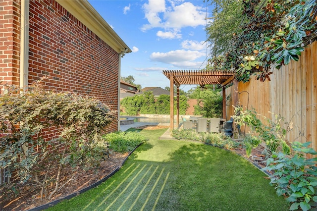 view of yard featuring a pergola and fence