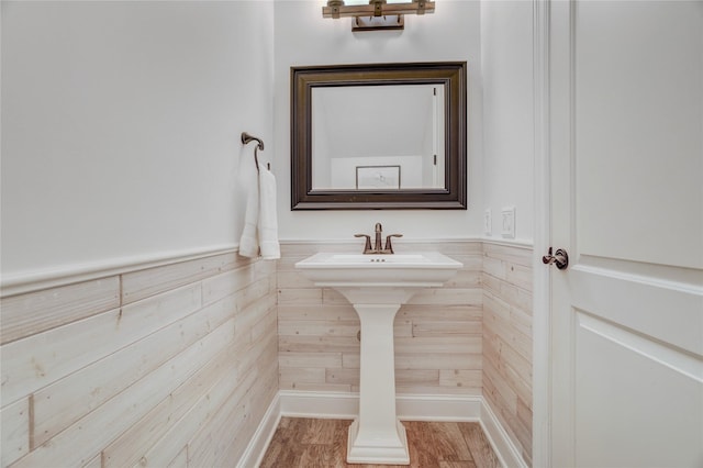 bathroom featuring wood finished floors