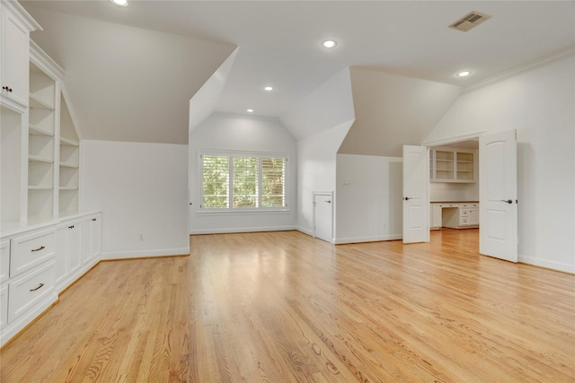 bonus room with light wood-type flooring, baseboards, lofted ceiling, visible vents, and recessed lighting