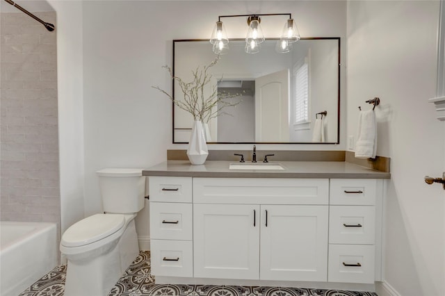 full bathroom featuring washtub / shower combination, tile patterned flooring, toilet, vanity, and baseboards