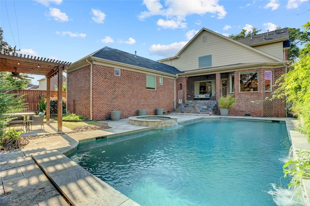 view of swimming pool with a pergola, fence, ceiling fan, a pool with connected hot tub, and a patio