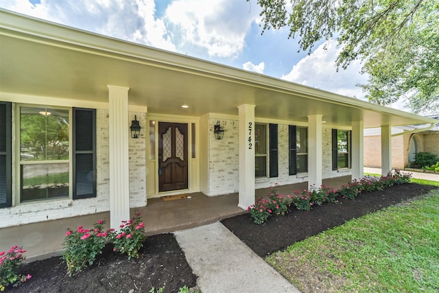 2742 Triway Ln, Houston, TX 77043 - view of exterior entry with covered porch and brick siding