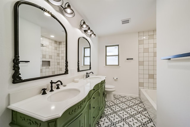 2742 Triway Ln, Houston, TX 77043 - bathroom with visible vents, a sink, tile patterned floors, and toilet